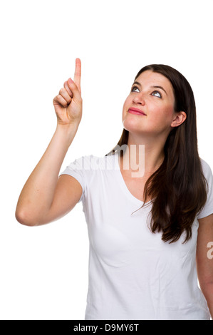 Junge Frau zeigt nach oben (Model Release) Stockfoto