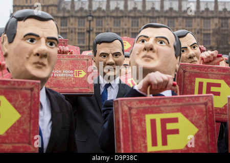 Genug Essen wenn Aktivisten versammeln sich in Westminster Osborne Versprechen einzuhalten der weltweit ärmsten fordere. Stockfoto