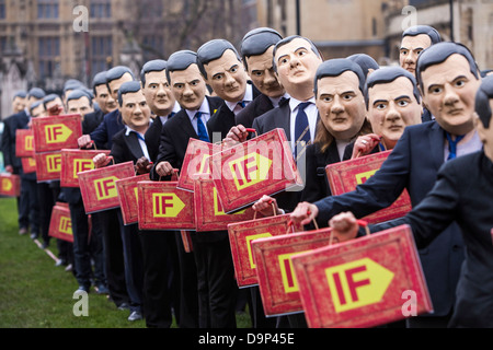 Genug Essen wenn Aktivisten versammeln sich in Westminster Osborne Versprechen einzuhalten der weltweit ärmsten fordere. Stockfoto