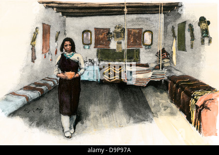 Pueblo der indischen Frau in Ihr adobe House, 1800. Hand - farbige Holzschnitt Stockfoto