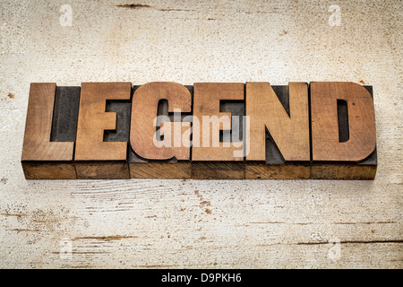 Legende-Wort in Vintage Buchdruck Holzart auf eine Grunge gemalt Scheune Holz Hintergrund Stockfoto