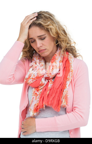 Blonde Mädchen mit Kopfschmerzen und Bauch Schmerzen Stockfoto