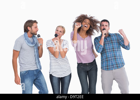 Spaß-Gruppe im Karaoke singen Stockfoto