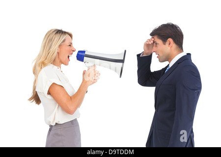 Geschäftsfrau, schrie ein Geschäftsmann mit Megaphon Stockfoto