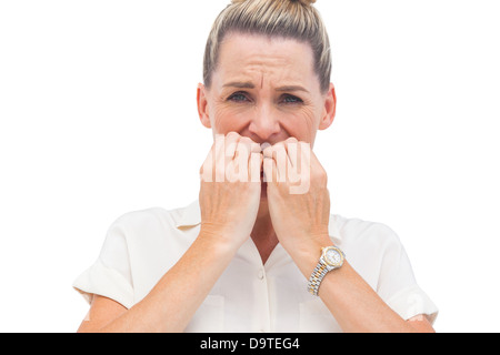 Geschäftsfrau, die Beißen Nägel Stockfoto