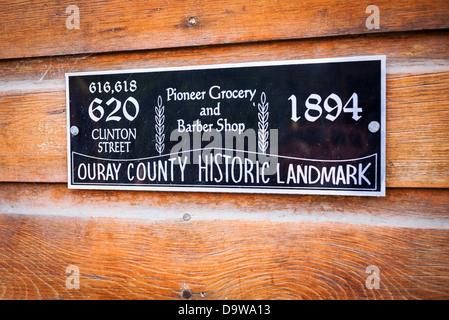Historische Pionier Lebensmittelgeschäft und Barber Shop Plaque, Ridgway, Colorado USA Stockfoto