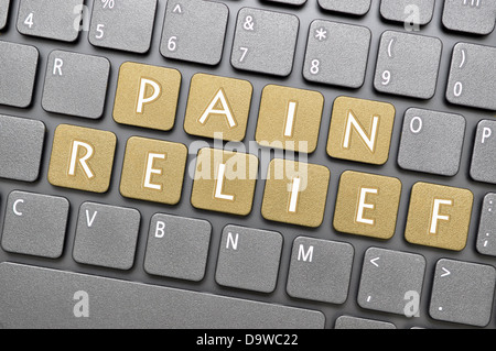 Schmerzlinderung auf Tastatur Stockfoto