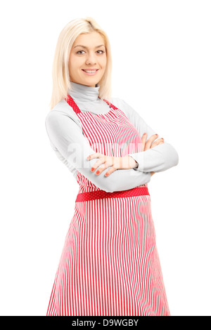 Blonde Frau trägt eine Schürze und Blick in die Kamera Lächeln Stockfoto