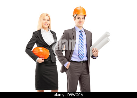 Zwei Architekten im Anzug hält Blaupausen Stockfoto