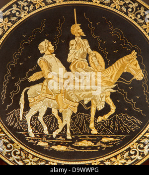 TOLEDO - März 8: Detail des typischen Tauschierung Platte mit Don Quijote und Sancho Panza. Stockfoto