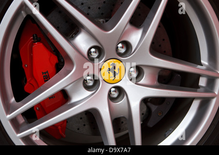 Close up of Ferrari alloy wheel with logo. Stockfoto