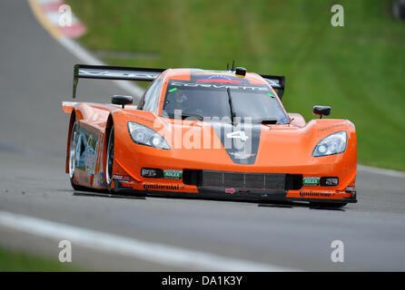 30. Juni 2013 - Watkins Glen, New York, USA - 30. Juni 2013: The 8 Sterne Motorsport Corvette (4) angetrieben von Emilio DiGuida und Luis Diaz während der GRAND-AM Rolex Series Sahlen sechs Stunden The Glen in Watkins Glen International in Watkins Glen, New York. Stockfoto