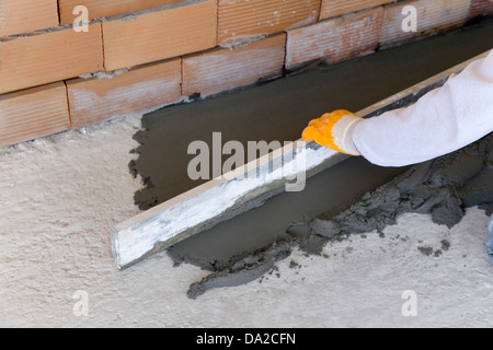 Verlegung von Bodenbelag Stockfoto