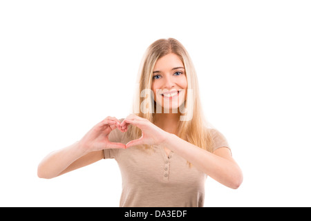 Schöne blonde Frau Lächeln auf den Lippen und ein Herz mit den Händen, isoliert auf weißem Hintergrund zu tun Stockfoto