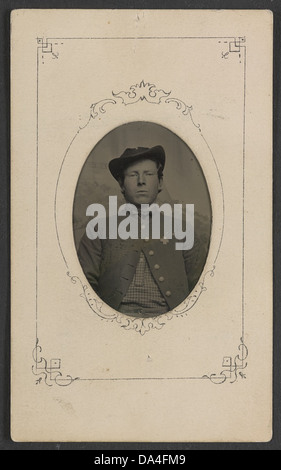 Dieses Foto, das von der Library of Congress aufbewahrt wird, zeigt einen nicht identifizierten Soldaten in Uniform mit einem Abzeichen des 6. Corps. Es stellt einen Moment aus dem Amerikanischen Bürgerkrieg dar und hebt die militärische Symbolik dieser Zeit hervor. Stockfoto