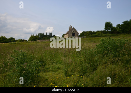 St. Oswald Kirche in dem mittelalterlichen Dorf von Widford in der Nähe von Burford, Oxfordshire Stockfoto