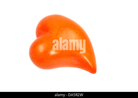 Isolierte orange Stein mit Herzform Stockfoto