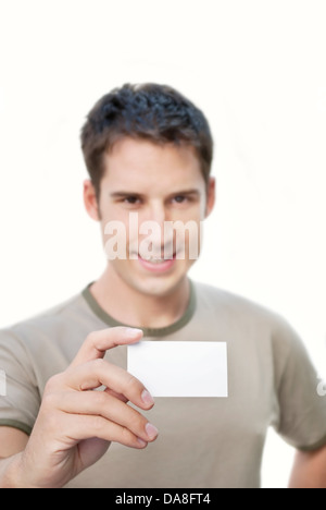 Lächelnd Mann Betrieb leer Karte in der hand Stockfoto