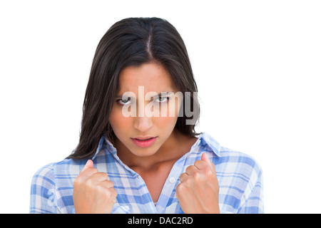 Böse Mädchen mit geschlossenen Fäusten Blick in die Kamera Stockfoto