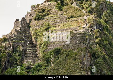 Machu Picchu Unesco Welt Kulturerbe Website alte steinerne Überreste Inkaruinen, Aguas Calientes, Peru. Stockfoto