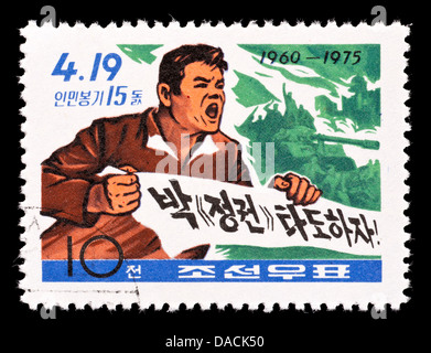 Briefmarke aus Nordkorea, die Darstellung der 19 April Südkorea Menschen Aufstand (fünfzehnten Jahrestag). Stockfoto