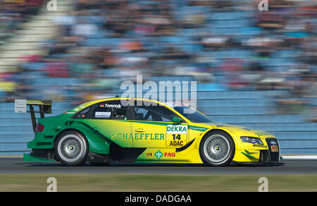 Der deutsche Rennfahrer Martin Tomczyk in Aktion während des Deutschen Tourenwagen Masters auf dem Hockenheimring in Hockenheim, Deutschland, 23. Oktober 2011. Foto: Uwe Anspach Stockfoto