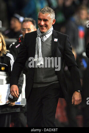 Hannovers Trainer Mirko Slomka feiert nach dem Gewinn der Champions League-Gruppe B Kopf Spiel FC Kopenhagen Vs Hannover 96 im Parken-Stadion in Kopenhagen, Dänemark, 3. November 2011. Foto: Peter Steffen Dpa +++(c) Dpa - Bildfunk +++ Stockfoto