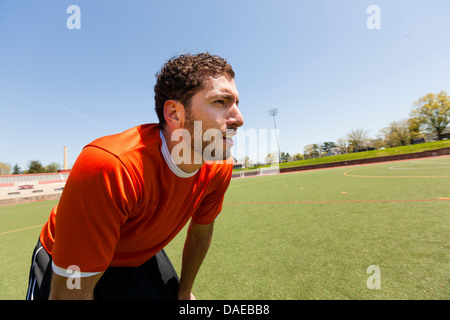 Fußball-Spieler eine Pause auf Platz Stockfoto