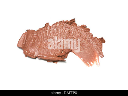 dunkel braun Bronzer / self tan Creme-Stiftung auf einem weißen Hintergrund ausschneiden Stockfoto