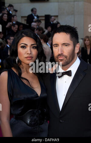 US-Musiker Trent Reznor und seine Frau Mariqueen Maandig kommen für die 83. Academy Awards, der Oscar-Verleihung in Los Angeles, USA, 27. Februar 2011. Foto: Hubert Boesl Stockfoto