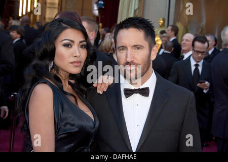 US-Musiker Trent Reznor und seine Frau Mariqueen Maandig kommen für die 83. Academy Awards, der Oscar-Verleihung in Los Angeles, USA, 27. Februar 2011. Foto: Hubert Boesl Stockfoto