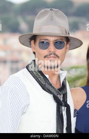 Schauspieler Johnny Depp besucht den Fototermin von "Pirates of the Caribbean: On Stranger Tides auf der 64. Internationalen Filmfestspiele von Cannes Palais des Festivals in Cannes, Frankreich, am 14. Mai 2011. Foto: Hubert Boesl Stockfoto