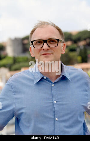 Österreichische Regisseur Markus Schleinzer stellt bei dem Fototermin von "Michael" auf der 64. Internationalen Filmfestspiele von Cannes am Palais des Festivals in Cannes, Frankreich, am 15. Mai 2011. Foto: Hubert Boesl Stockfoto