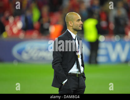 Barcelonas Trainer Josep Guardiola steht auf dem Platz nach der UEFA Champions League Finale zwischen FC Barcelona und Manchester United im Wembley-Stadion, London, Großbritannien, 28. Mai 2011. Foto: Soeren Stache Stockfoto