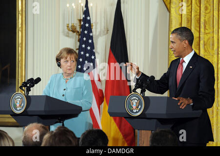 U.S.-Präsident Barack Obama Und Bundeskanzlerin Angela Merkel (CDU) Satzglieder bin Dienstag (07.06.2011) Im Weißen Haus in Washington (USA) Nach Ihren Gesprächen Eine Festbetragssystem Pressekonferenz. Merkel ist Zu Einem Zweitägigen Besuch in Den Vereinigten Staaten. Foto: Rainer Jensen dpa Stockfoto