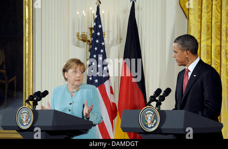 U.S.-Präsident Barack Obama Und Bundeskanzlerin Angela Merkel (CDU) Satzglieder bin Dienstag (07.06.2011) Im Weißen Haus in Washington (USA) Nach Ihren Gesprächen Eine Festbetragssystem Pressekonferenz. Merkel ist Zu Einem Zweitägigen Besuch in Den Vereinigten Staaten. Foto: Rainer Jensen dpa Stockfoto