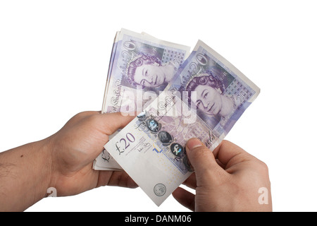 Zählen zwanzig Pfund; Britische Banknoten, in weißen Hintergrund isoliert Stockfoto