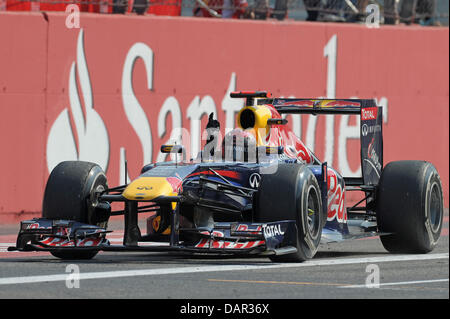 Deutsche Formel1-Fahrer Sebastian Vettel von Red Bull überquert die Ziellinie und gewinnt den GP von Italien auf der Rennstrecke Autodromo Nazionale Monza, Italien, 11. September 2011. Die Formel 1 Grand Prix von Italien ist der letzten Europa-Rennen der Saison 2011. Foto: David Ebener Dpa +++(c) Dpa - Bildfunk +++ Stockfoto