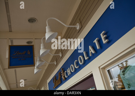 Wertaufbewahrungsmittel Lindt Schokolade ist bei der Siedlern Green Outlet Village in North Conway, New Hampshire abgebildet. Stockfoto