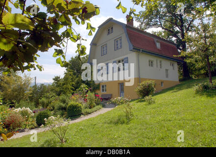 Das Bild zeigt das Septembertag-Haus in Murnau, Deutschland, 23. Juli 2007. Deutsche expressionistische Malerin Gabriele Muenter (1877-1962) kaufte das Haus im Jahre 1908 und lebte dort mit ihrem ersten Partner, Russland geborenen expressionistischen Maler Wassily Kandinsky (1866-1944), bis 1914 und später ihren zweiten Partner Johannes Eichner bis zu ihrem Tod im Jahr 1962. Viele Ideen der berühmten Künstlergruppe ' Th Stockfoto