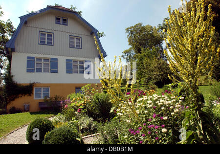 Das Bild zeigt das Septembertag-Haus in Murnau, Deutschland, 23. Juli 2007. Deutsche expressionistische Malerin Gabriele Muenter (1877-1962) kaufte das Haus im Jahre 1908 und lebte dort mit ihrem ersten Partner, Russland geborenen expressionistischen Maler Wassily Kandinsky (1866-1944), bis 1914 und später ihren zweiten Partner Johannes Eichner bis zu ihrem Tod im Jahr 1962. Viele Ideen der berühmten Künstlergruppe ' Th Stockfoto