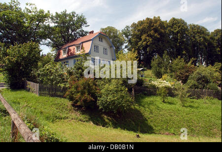 Das Bild zeigt das Septembertag-Haus in Murnau, Deutschland, 23. Juli 2007. Deutsche expressionistische Malerin Gabriele Muenter (1877-1962) kaufte das Haus im Jahre 1908 und lebte dort mit ihrem ersten Partner, Russland geborenen expressionistischen Maler Wassily Kandinsky (1866-1944), bis 1914 und später ihren zweiten Partner Johannes Eichner bis zu ihrem Tod im Jahr 1962. Viele Ideen der berühmten Künstlergruppe ' Th Stockfoto