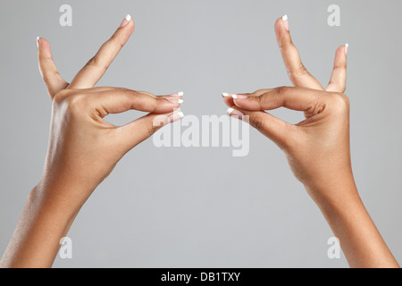 Weibes Hände kommunizierenden Geste Stockfoto