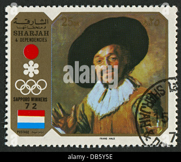 Emirat SHARJAH - ca. 1972: Eine Briefmarke gedruckt im Emirat Sharjah zeigt Bild des Frans Hals die ältere. Stockfoto