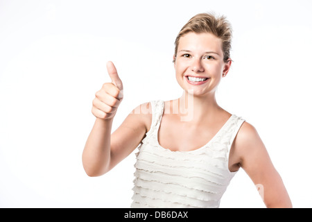 Lachen, junge schöne Frau hält den Daumen hoch, isoliert auf weißem Hintergrund Stockfoto