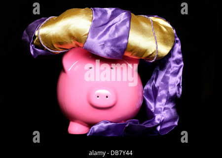 Sparschwein Genie auf schwarzem Hintergrund Stockfoto