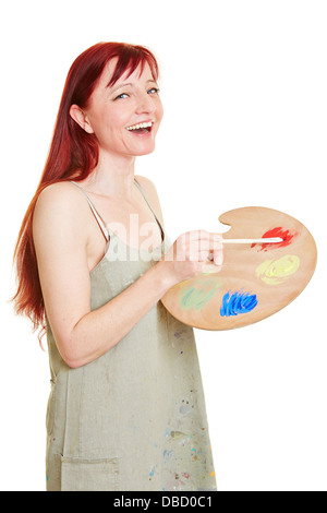 Glücklich Malerin mit Farbmischung palette Stockfoto