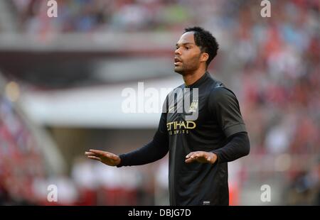 München, Deutschland. 31. Juli 2013. Manchesters Joleon Lescott Gesten während der Audi Cup Fussball Halbfinale Spiel Manchester City Vs AC Milan im Allianz Arena in München, 31. Juli 2013. Foto: Andreas Gebert/Dpa/Alamy Live-Nachrichten Stockfoto