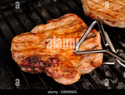 Kotelett auf dem BBQ-grill Stockfoto