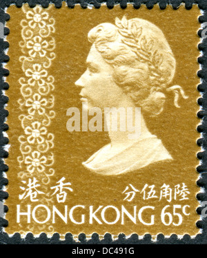 HONG KONG - ca. 1975: Eine Briefmarke gedruckt in Hong Kong, Bild von Königin Elizabeth II, ca. 1975 Stockfoto